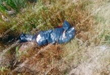 Hallan a mujer embolsada en terreno de cultivo en Nexquipayac, Atenco